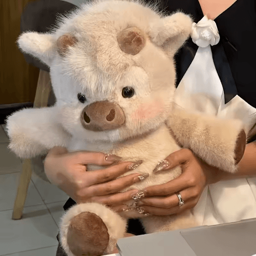 Mini-Moo ZoomieMoo – a compact fluffy beige cow plushie